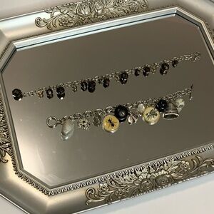 One amber bracelet and one beehive bracelet